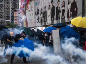 U neredima u Hongkongu demonstranti zapalili čoveka